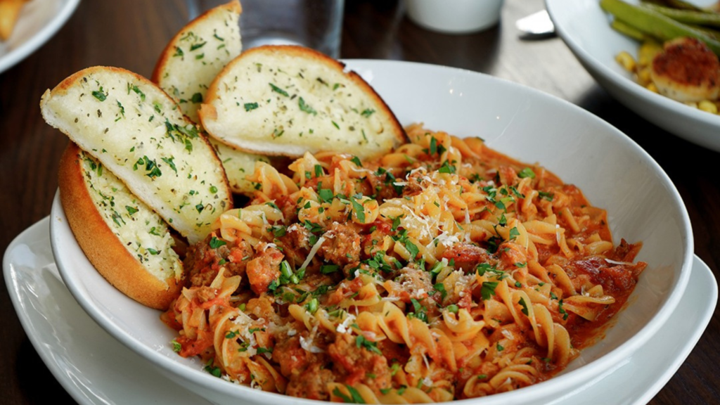 Burtons Grill and Bar Pasta and bread in a bowl - Adam Tobin