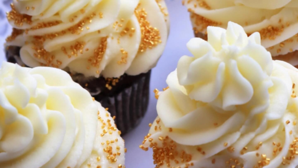 chocolate cupcake with white frosting at Good Day Cafe - Adam Tobin Law